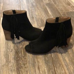 Peep toe fringe booties